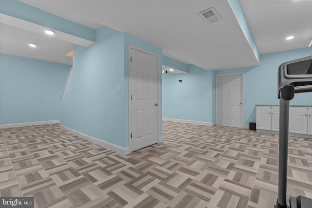 basement with light parquet flooring