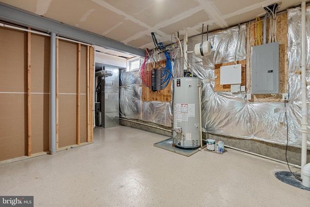 basement with electric panel and water heater