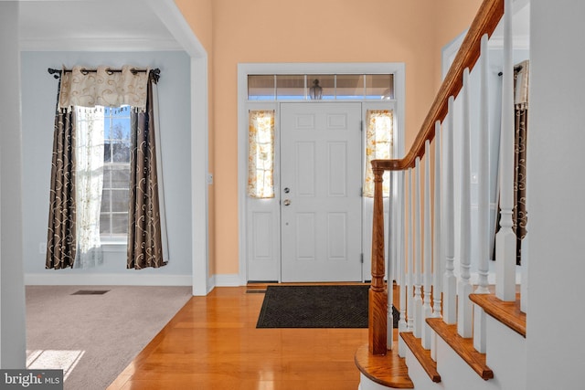 entryway with light hardwood / wood-style flooring