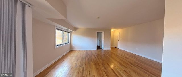 unfurnished room featuring light hardwood / wood-style flooring