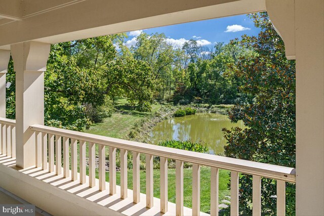 720 Swedesford Rd, Lower Gwynedd, PA 19002 - balcony featuring a water view and view of scattered trees