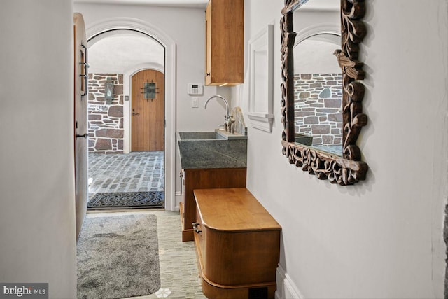 720 Swedesford Rd, Lower Gwynedd, PA 19002 - corridor featuring arched walkways and a sink