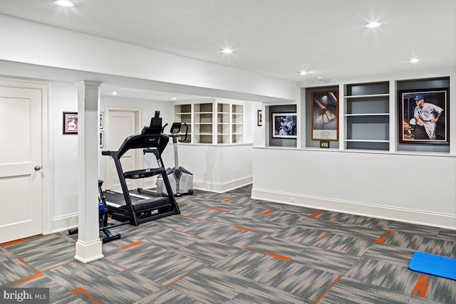 exercise room with dark carpet