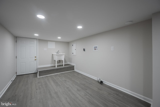 1823 N Caroline St, Baltimore, MD 21213 - laundry room with hookup for a washing machine, dark wood-style flooring, baseboards, recessed lighting, and electric panel