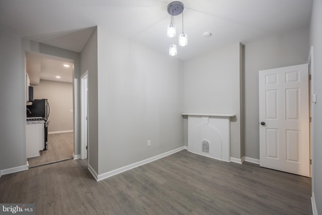 empty room featuring dark wood-type flooring