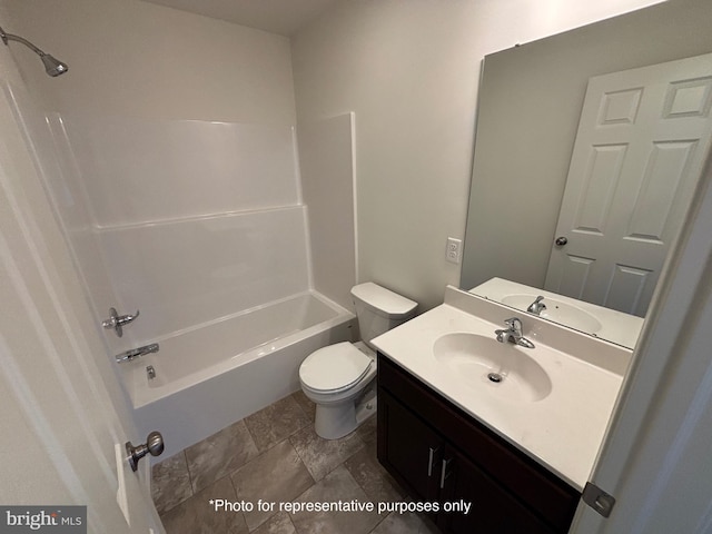 full bathroom featuring vanity, tub / shower combination, and toilet