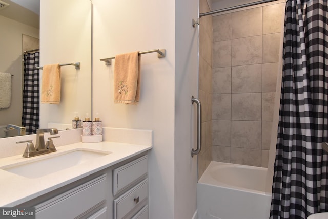 bathroom with vanity and shower / tub combo