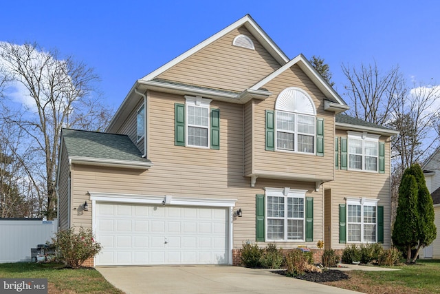 view of front of property featuring a garage