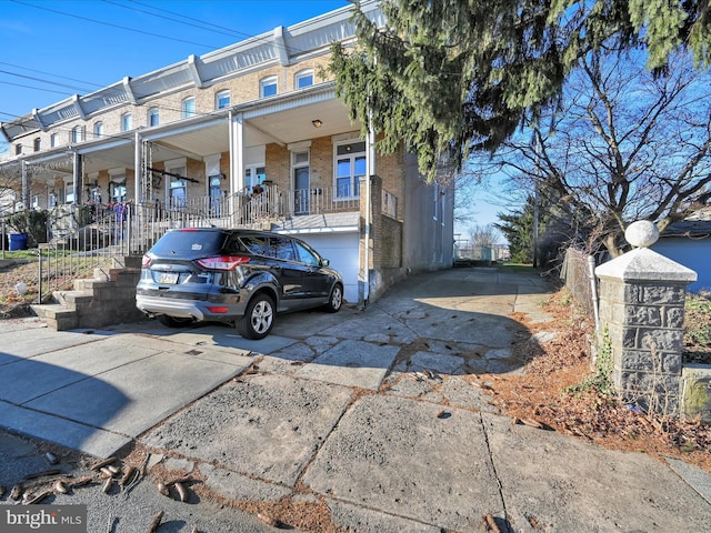 view of front of property with a garage