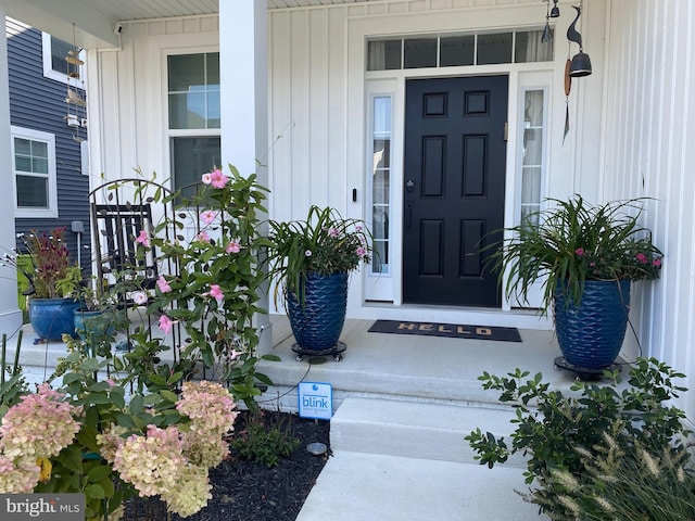 entrance to property with a porch