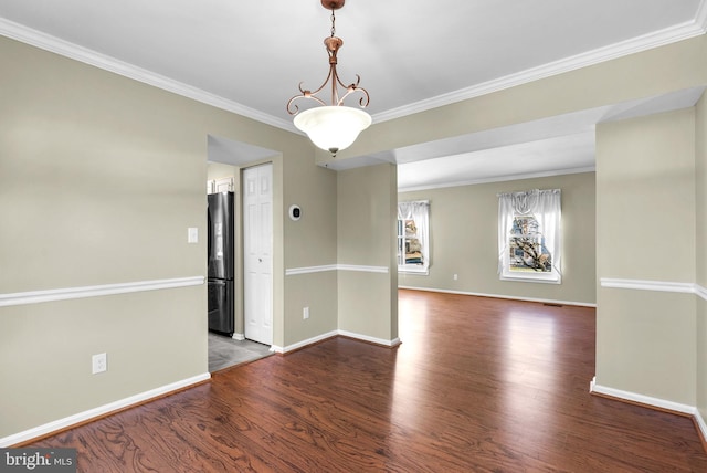 unfurnished room with crown molding and dark wood-type flooring