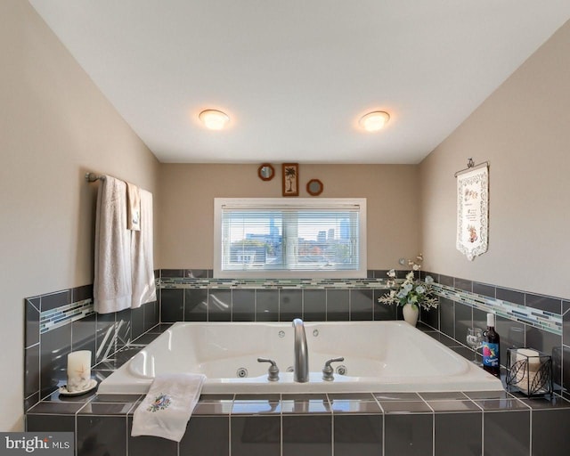 bathroom featuring tiled bath