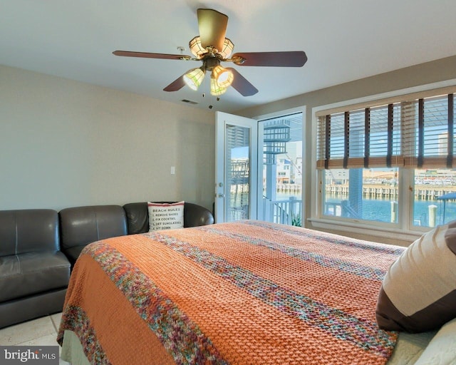 bedroom featuring access to exterior and ceiling fan