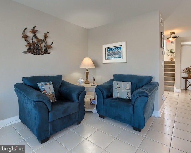 living room with tile patterned floors