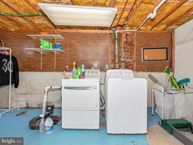 washroom with independent washer and dryer