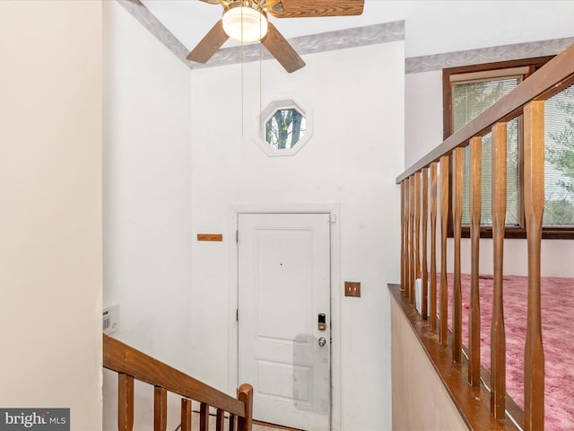 foyer featuring plenty of natural light and ceiling fan