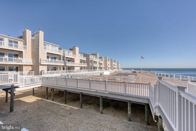 view of home's community featuring a water view