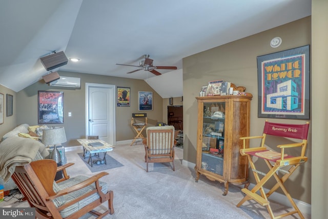 sitting room featuring carpet, a wall unit AC, lofted ceiling, and ceiling fan