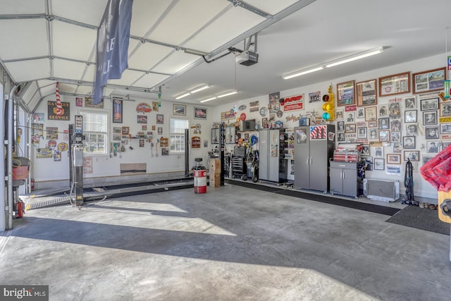 garage featuring a garage door opener