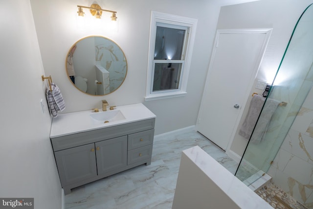 bathroom featuring vanity and tiled shower