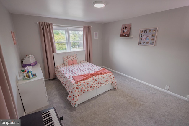 bedroom featuring carpet