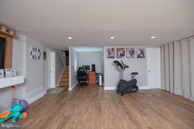 interior space with hardwood / wood-style floors