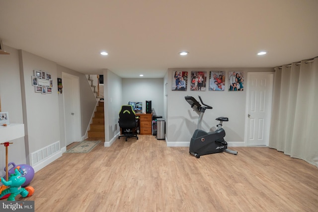 office with light wood-type flooring