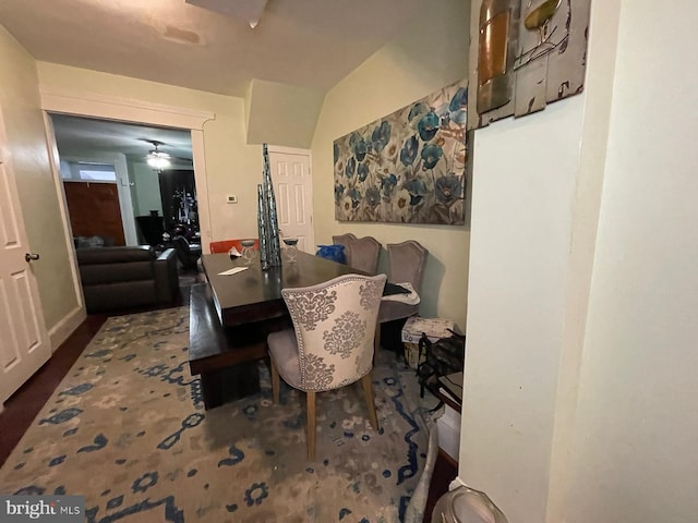 dining room featuring vaulted ceiling and ceiling fan