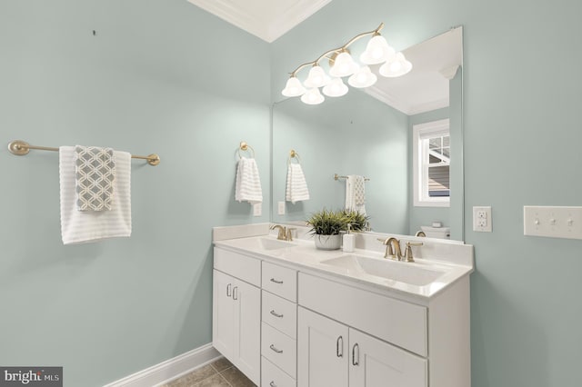 bathroom featuring vanity, tile patterned floors, and ornamental molding