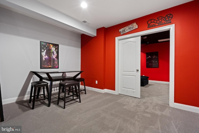 dining room with carpet floors