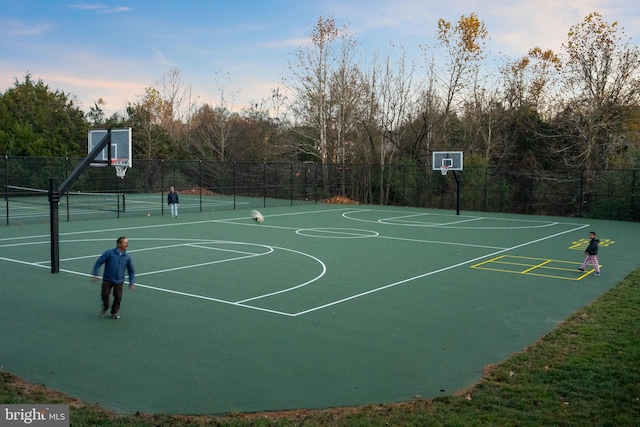 view of sport court featuring tennis court