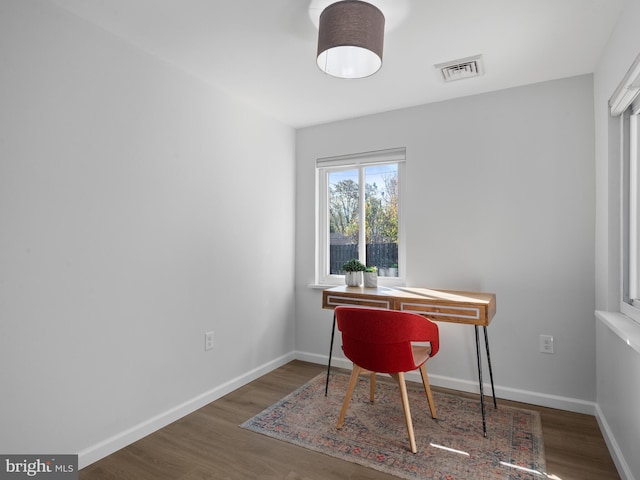 home office featuring dark hardwood / wood-style floors