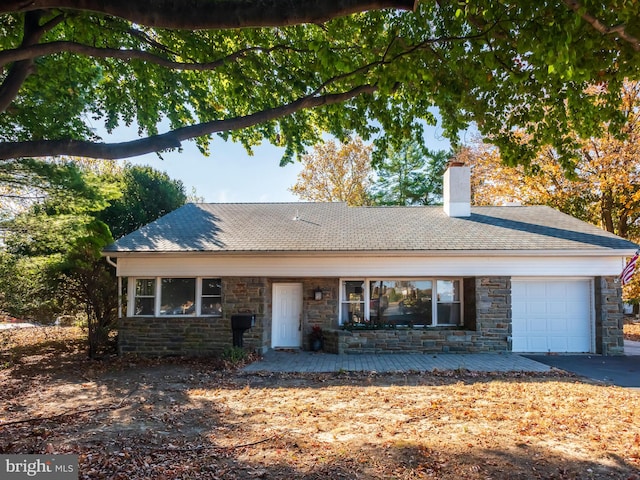 ranch-style house with a garage