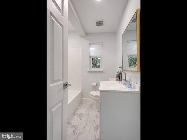 full bathroom featuring toilet, vanity, and bathing tub / shower combination