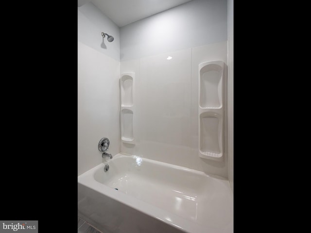 bathroom featuring washtub / shower combination