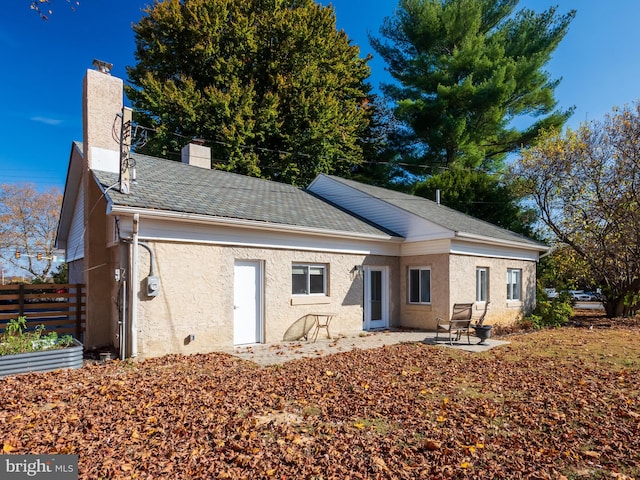 rear view of house featuring a patio area