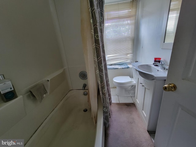 full bathroom with plenty of natural light, vanity, toilet, and shower / tub combo