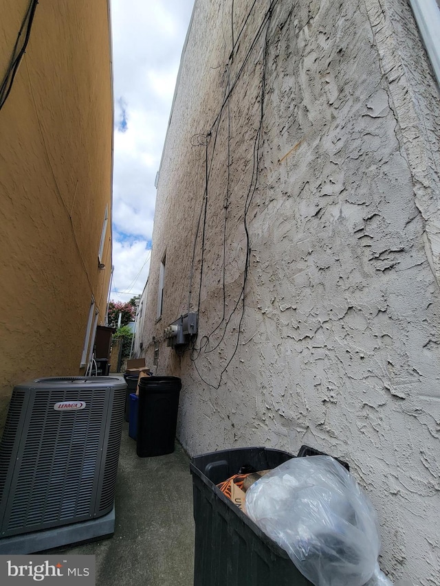 view of home's exterior featuring central air condition unit