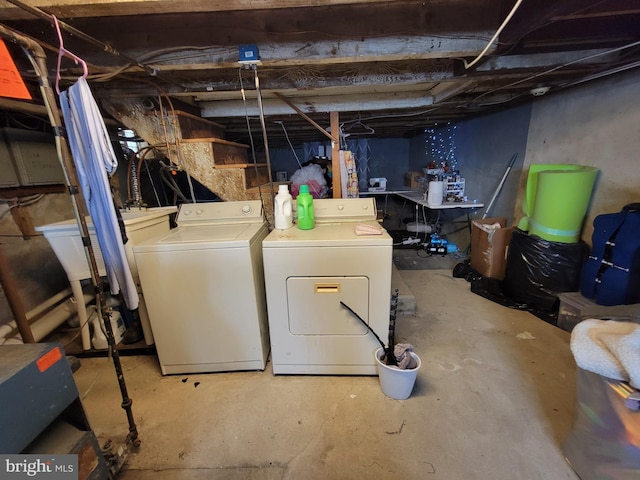 basement with separate washer and dryer