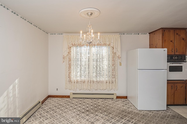 unfurnished dining area with a baseboard radiator, light tile patterned floors, and a notable chandelier