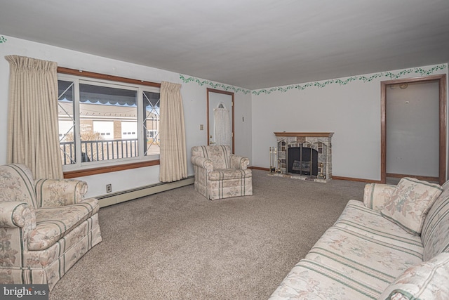 carpeted living room with a stone fireplace and a baseboard radiator