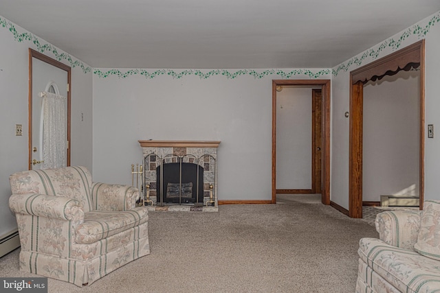 living room featuring carpet flooring and a stone fireplace