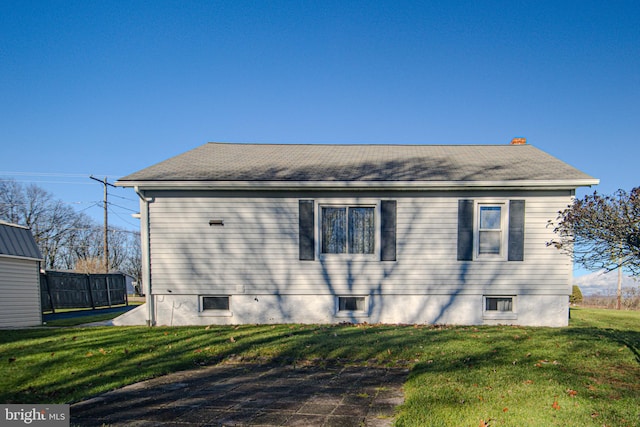 exterior space with a yard