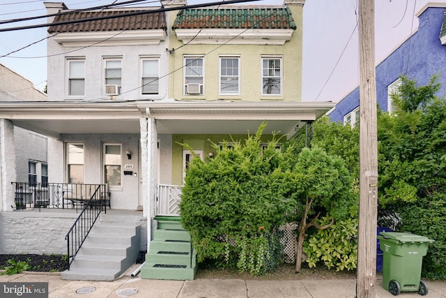 multi unit property featuring covered porch