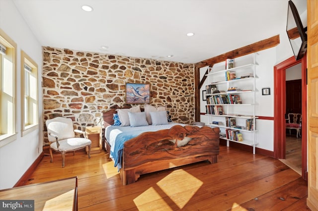 bedroom featuring hardwood / wood-style floors