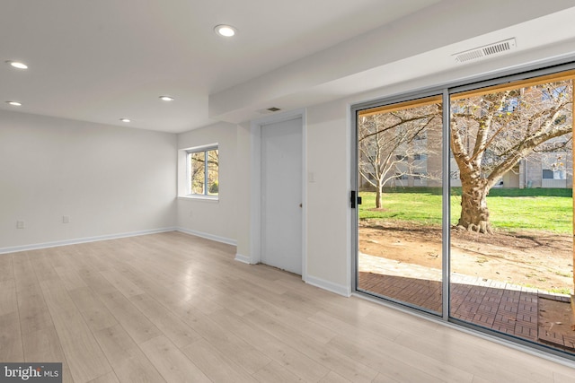 empty room with light wood-type flooring