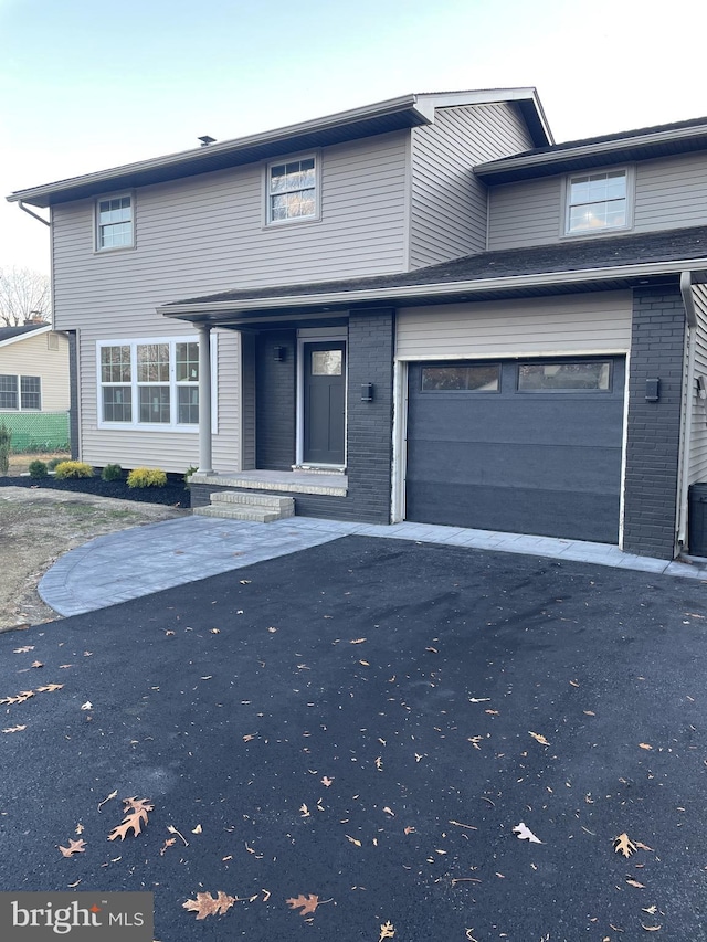 view of property featuring a garage