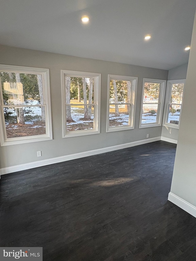 unfurnished sunroom with a wealth of natural light