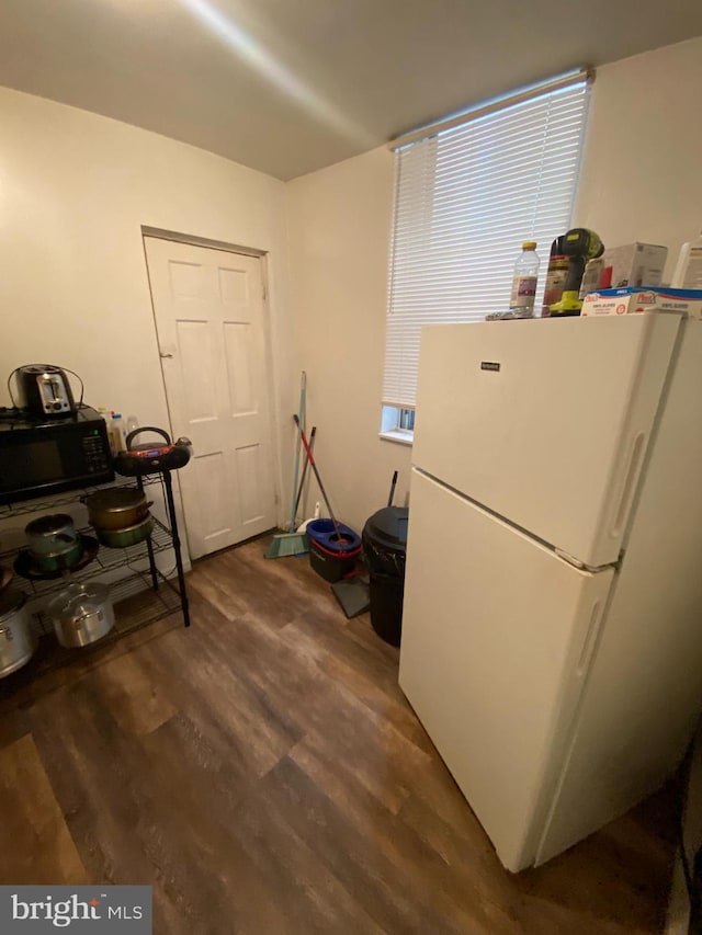 interior space with dark wood-type flooring