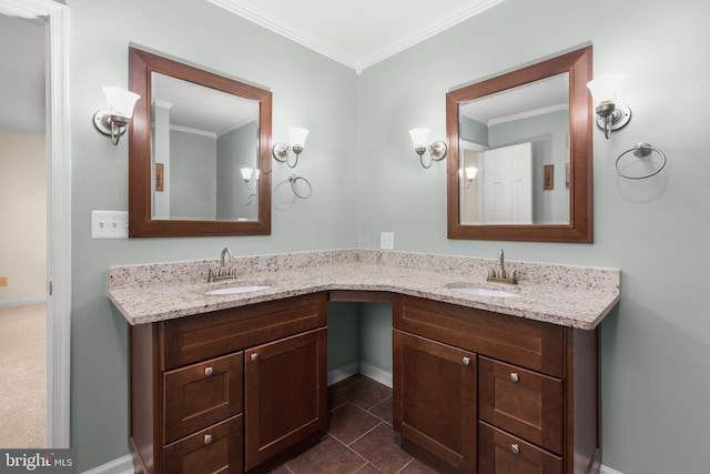 bathroom with tile patterned floors, crown molding, and vanity